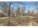 Large backyard featuring raised garden beds, perfect for the avid gardener to design their own garden at 755 Newark St, Aurora, CO 80010