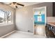 Cozy dining area adjacent to the kitchen and a bright blue room at 755 Newark St, Aurora, CO 80010