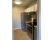 Efficient kitchen featuring stainless steel appliances and ample counter space at 1415 Bacchus Dr # D9, Lafayette, CO 80026