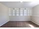 Cozy bedroom with neutral carpet, built-in shelving, and a peaceful atmosphere at 11524 Marshall Ct, Broomfield, CO 80020