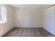Carpeted bedroom featuring a large window, closet, and neutral walls at 11524 Marshall Ct, Broomfield, CO 80020