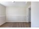 Bright bedroom featuring neutral walls, carpet, closet, and base trim at 11524 Marshall Ct, Broomfield, CO 80020