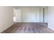 Bright bedroom featuring neutral walls, carpet, closet, and open door at 11524 Marshall Ct, Broomfield, CO 80020