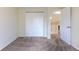 Bedroom featuring a closet, window, and access to the upstairs landing at 11524 Marshall Ct, Broomfield, CO 80020