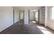 Bright bedroom featuring neutral walls, carpet, mirrored closet, and shelves at 11524 Marshall Ct, Broomfield, CO 80020