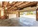 Spacious two car garage with unfinished walls and ceiling at 11524 Marshall Ct, Broomfield, CO 80020