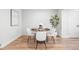 Elegant dining room with modern decor, stylish chairs, and ample space for entertaining guests at 2275 S Yosemite Cir, Denver, CO 80231