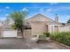 Charming home with a two-car garage, beautiful siding, and well-maintained landscaping at 2275 S Yosemite Cir, Denver, CO 80231
