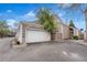 Charming home with a two-car garage, beautiful stone accents, and well-maintained landscaping at 2275 S Yosemite Cir, Denver, CO 80231