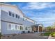 Spacious backyard featuring a dining area, grill, and gravel, ideal for enjoying outdoor gatherings and barbecues at 11023 Pastel Pt, Parker, CO 80134