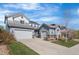 Beautiful two-story home with a three-car garage, offering ample parking and storage space in a well-maintained neighborhood at 11023 Pastel Pt, Parker, CO 80134