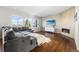 Inviting living room featuring a sleek fireplace, large windows and a comfortable seating arrangement at 11023 Pastel Pt, Parker, CO 80134