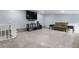 Spacious basement featuring carpet flooring, light colored walls and neutral decor at 1945 Yarrow St, Lakewood, CO 80214