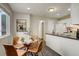 Bright dining area with modern decor and convenient access to the kitchen at 4720 S Bannock St, Englewood, CO 80110