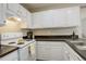 Efficient kitchen featuring ample cabinet space and modern appliances at 4720 S Bannock St, Englewood, CO 80110
