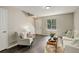 Cozy living room with stylish decor, modern furnishings, and a bright window at 4720 S Bannock St, Englewood, CO 80110