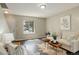 Comfortable living room with modern furnishings, stylish decor, and natural light at 4720 S Bannock St, Englewood, CO 80110