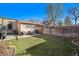 Spacious backyard with grassy area and detached structure at 3403 N Raleigh St, Denver, CO 80212