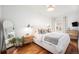 Cozy bedroom with hardwood floors and plenty of natural light at 3403 N Raleigh St, Denver, CO 80212