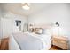 Main bedroom features hardwood floors and en-suite bathroom access at 3403 N Raleigh St, Denver, CO 80212