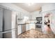 Modern kitchen with stainless steel appliances and granite countertops at 3403 N Raleigh St, Denver, CO 80212