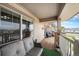 Cozy balcony with outdoor seating and a view of the neighborhood and blue sky at 10818 Cimarron St # 206, Firestone, CO 80504