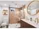 This bathroom is equipped with a double vanity and a modern-style shower at 3622 Lowell Blvd, Denver, CO 80211