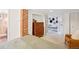 This bedroom has a decorative brick accent wall, closet, and unique wall decor at 3622 Lowell Blvd, Denver, CO 80211