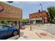 View of Highlands Square in Historic Northwest Denver featuring shops, restaurants, and a vibrant urban atmosphere at 3622 Lowell Blvd, Denver, CO 80211