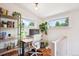 Bright office featuring lots of natural light, a work space, and shelving for organization and a comfortable work environment at 3622 Lowell Blvd, Denver, CO 80211