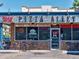 Exterior of Pizza Alley restaurant, showcasing its classic facade, signage, and outdoor seating in an urban setting at 3622 Lowell Blvd, Denver, CO 80211