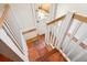 Staircase leading to the backyard, featuring a terracotta tile landing and convenient outdoor access at 3622 Lowell Blvd, Denver, CO 80211