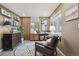Stylish living space featuring wood accents, modern decor, and ample natural light at 6948 Buckskin Dr, Littleton, CO 80125