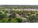 Aerial view showcasing the community's lush landscaping, walking paths, and convenient shopping access at 1758 S Pitkin Cir # A, Aurora, CO 80017