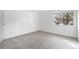 Bright bedroom featuring neutral carpet, a large window and white walls at 1758 S Pitkin Cir # A, Aurora, CO 80017