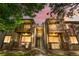 Charming condo building featuring balconies with stone accents and mountain views at sunset at 1758 S Pitkin Cir # A, Aurora, CO 80017