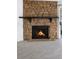 Charming stone fireplace creates a cozy focal point in the living space at 1758 S Pitkin Cir # A, Aurora, CO 80017