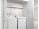 Convenient laundry closet featuring a washer and dryer setup and storage space at 1758 S Pitkin Cir # A, Aurora, CO 80017