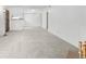 The wide-open living space is filled with sunlight and has plush neutral carpeting throughout at 1758 S Pitkin Cir # A, Aurora, CO 80017