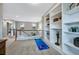 Upstairs hallway with a reading nook and a beautiful bookcase at 1416 Red Mica Way, Monument, CO 80132