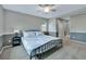 Main bedroom featuring carpet and a view of the bathroom and walk in closet at 1416 Red Mica Way, Monument, CO 80132