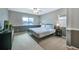 Main bedroom featuring a ceiling fan, carpet, and a large window at 1416 Red Mica Way, Monument, CO 80132