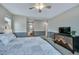 Main bedroom leading to the bathroom featuring a walk in closet at 1416 Red Mica Way, Monument, CO 80132