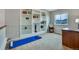 Bright room with built in shelves and desk area perfect for home office at 1416 Red Mica Way, Monument, CO 80132