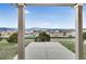 Covered patio with beautiful mountain views overlooking nearby new construction at 1416 Red Mica Way, Monument, CO 80132