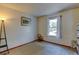 Bedroom featuring neutral walls, a small rocking chair and natural light at 8555 Angela Ln, Parker, CO 80134