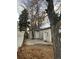 Backyard with patio, trees, and detached garage at 3092 S Kearney St, Denver, CO 80222