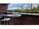 Balcony with mountain views and table and chairs at 555 S Park Ave # 202, Breckenridge, CO 80424