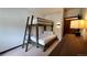 Bedroom with bunk beds and dresser at 555 S Park Ave # 202, Breckenridge, CO 80424
