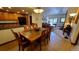 Open concept dining area with kitchen and living room views at 555 S Park Ave # 202, Breckenridge, CO 80424